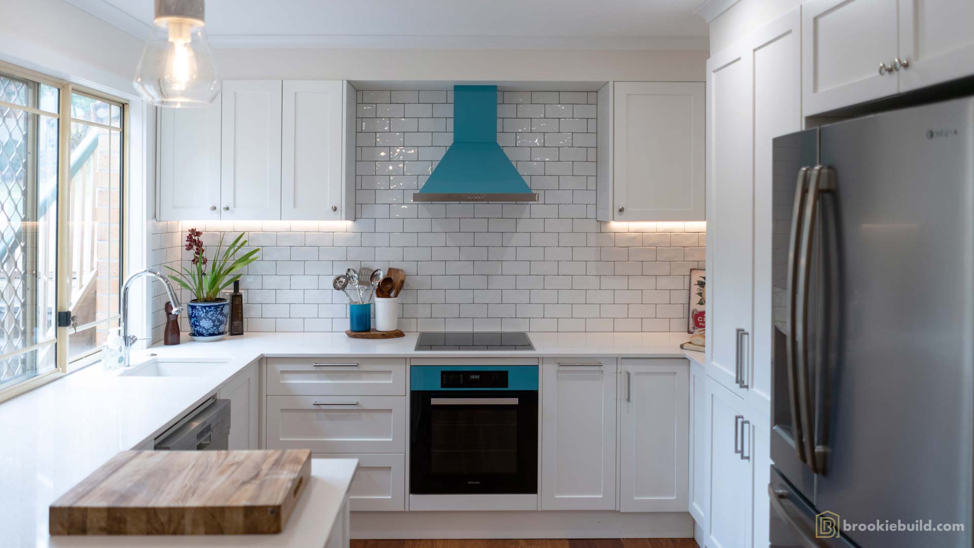 Kenmore entertainers kitchen with wet bar in a townhouse by Brookie Build