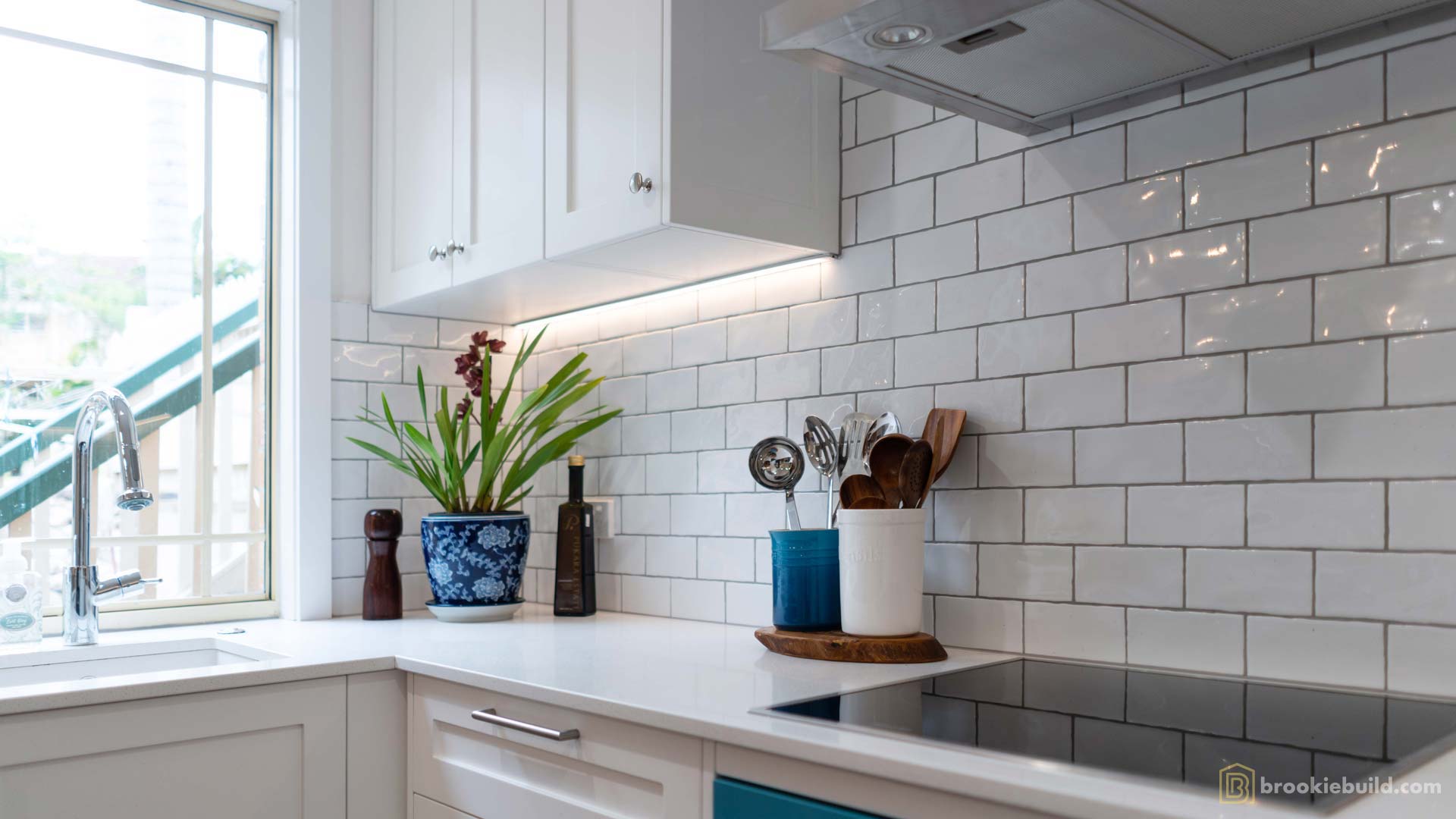 Kenmore entertainers kitchen with wet bar in a townhouse by Brookie Build