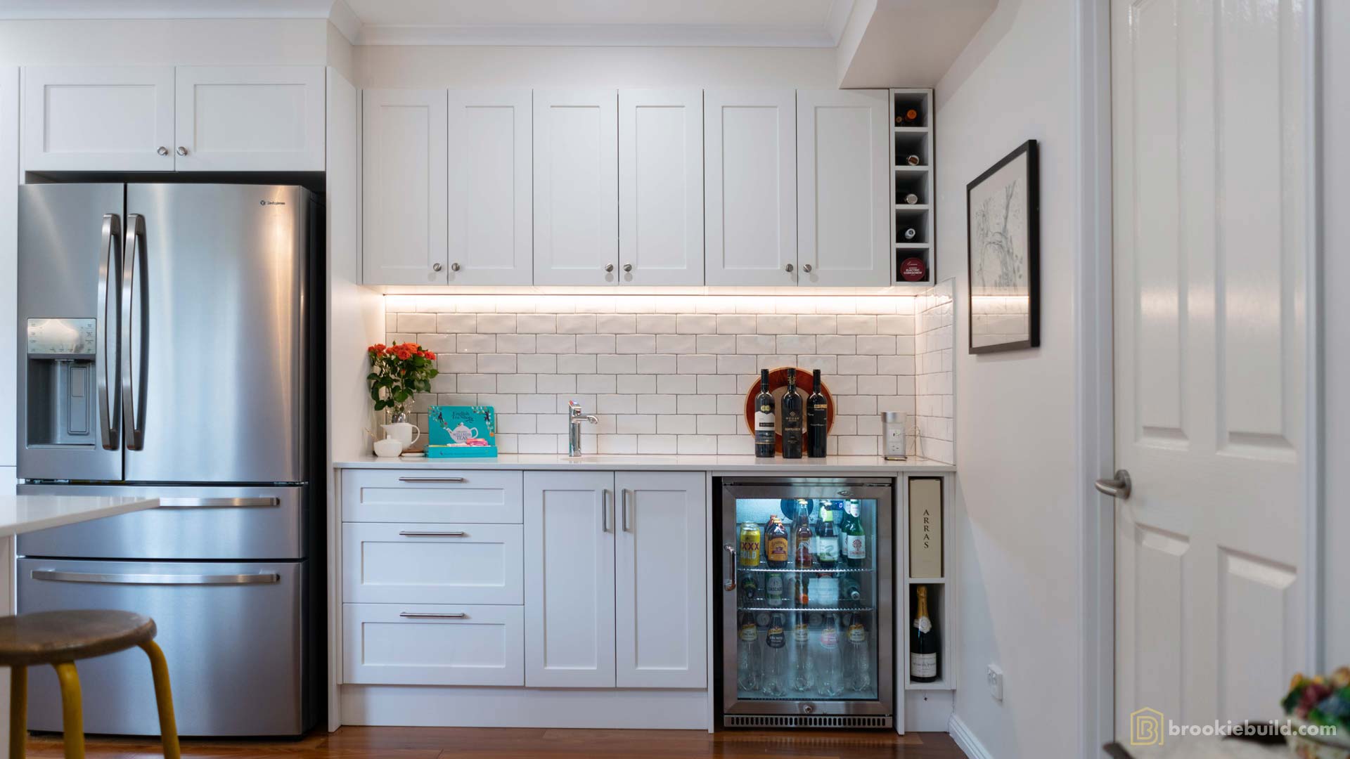 Kenmore entertainers kitchen with wet bar in a townhouse by Brookie Build