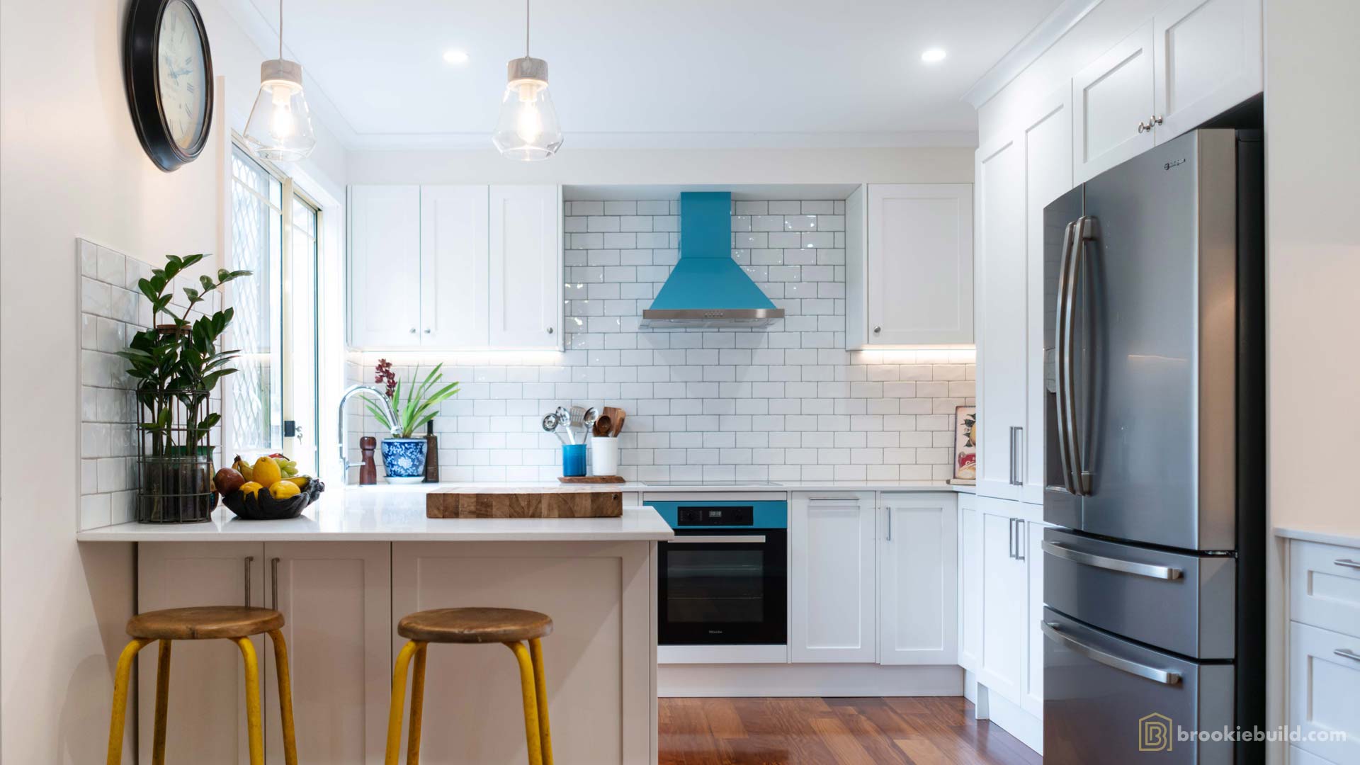 Kenmore entertainers kitchen with wet bar in a townhouse by Brookie Build