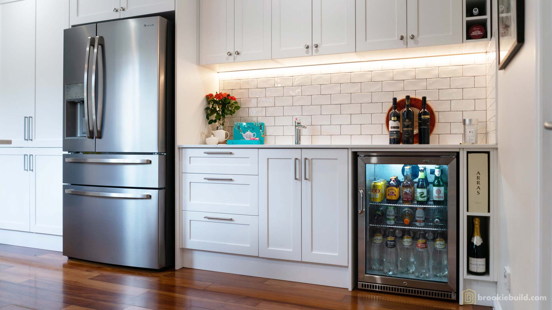 Kenmore entertainers kitchen with wet bar in a townhouse by Brookie Build