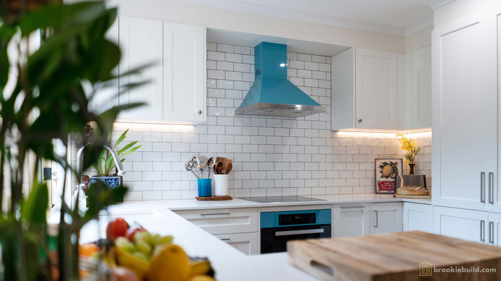 Kenmore entertainers kitchen with wet bar in a townhouse by Brookie Build