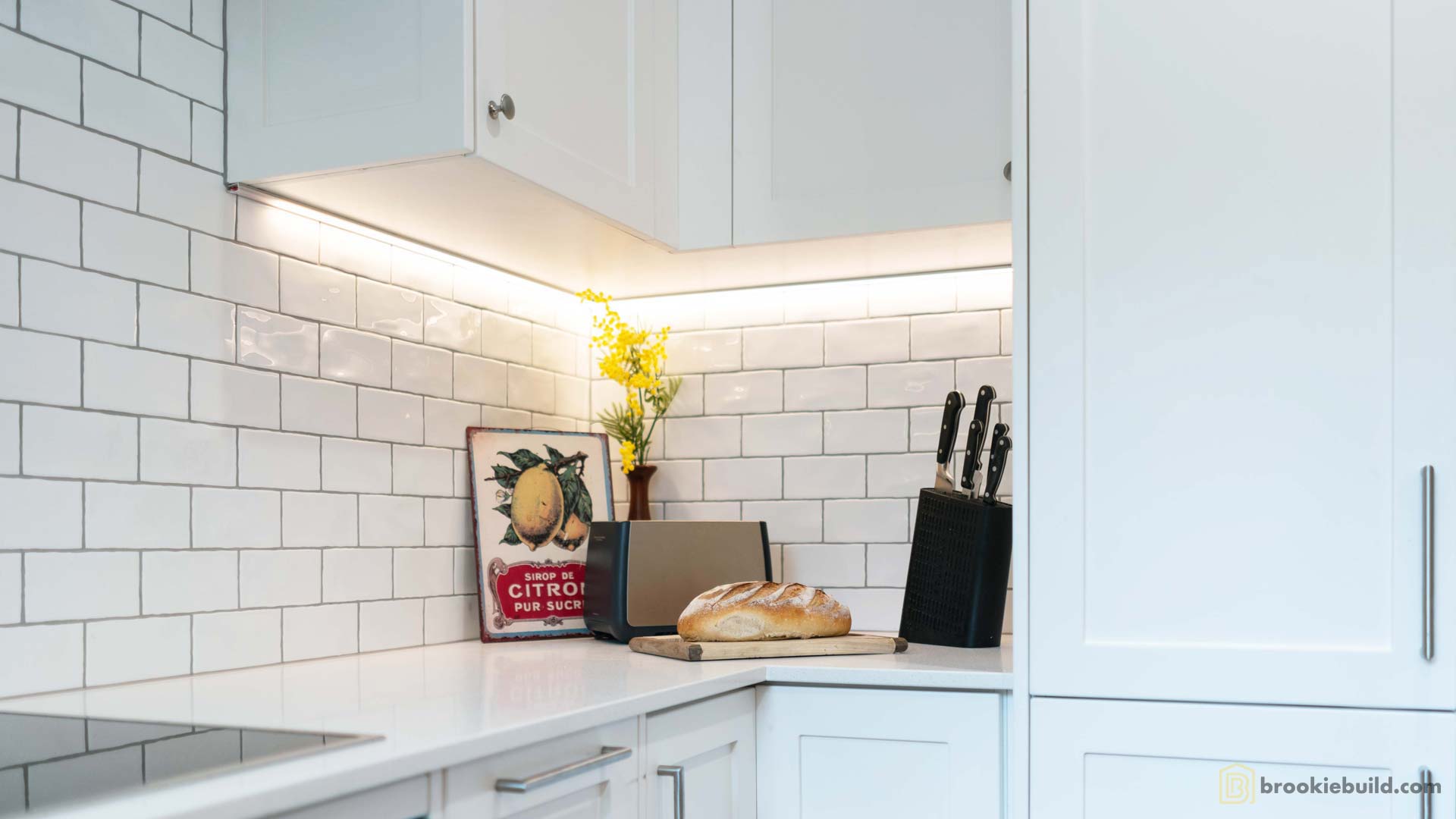 Kenmore entertainers kitchen with wet bar in a townhouse by Brookie Build